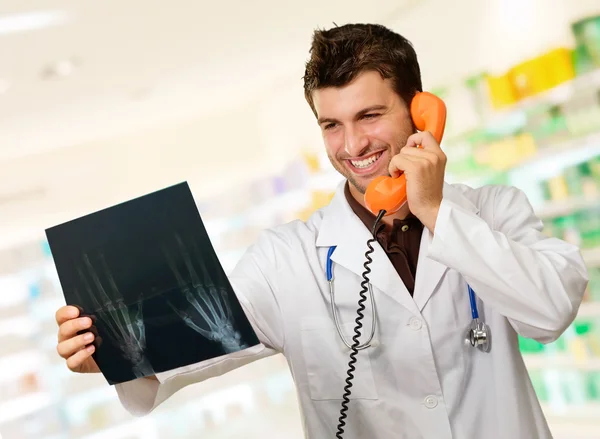 Portrait Of A Doctor Holding Phone And X-ray — Stock Photo, Image
