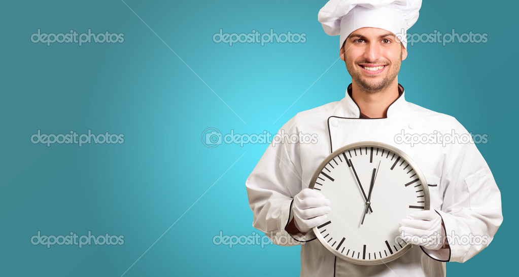 Chef Holding A Wall Clock