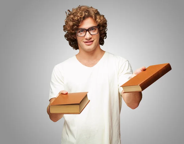 Portrait Of A Young Student Holding Books — Stock Photo, Image