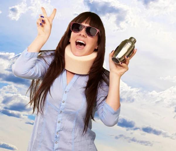 Woman Wearing Neckbrace Holding A Shaker — Stock Photo, Image