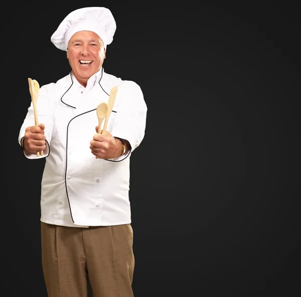 Portret szefa kuchni trzymając łyżka — Zdjęcie stockowe