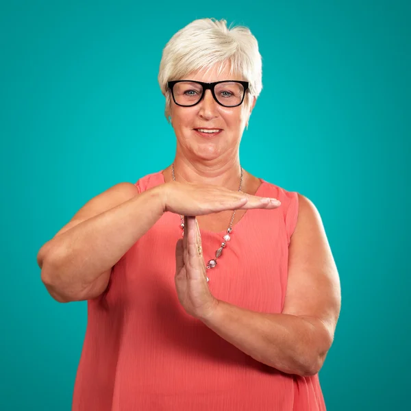 Portrait Of A Senior Woman Showing Time Out Signal — Stock Photo, Image