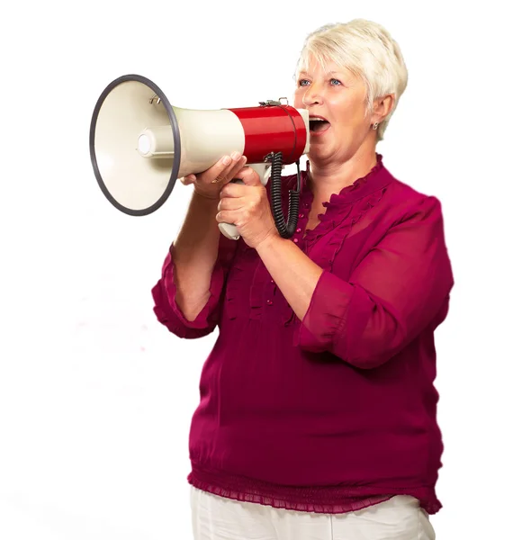 Retrato de uma mulher sênior com megafone — Fotografia de Stock