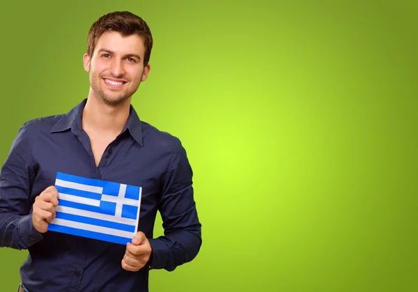 Man Holding Greece Flag — Stock Photo, Image