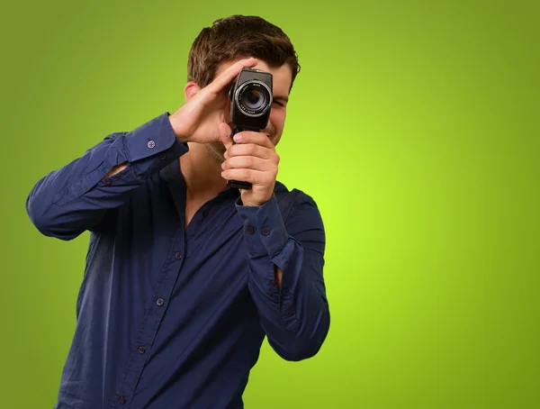 Young Man Holding Old Camera — Stok fotoğraf