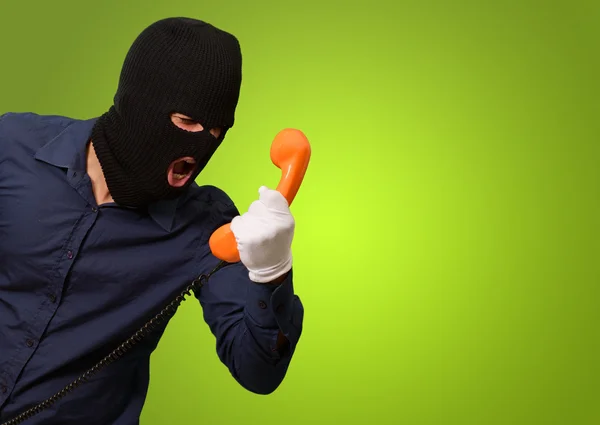 Burglar Man Holding Telephone — Stock Photo, Image