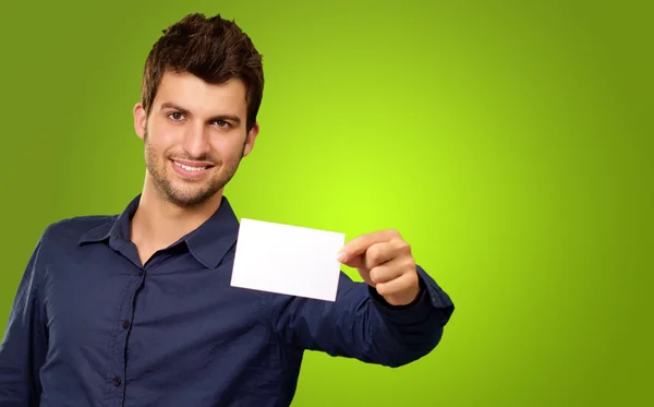 Portrait Of Young Man Holding Blank White Card — Stock Photo, Image