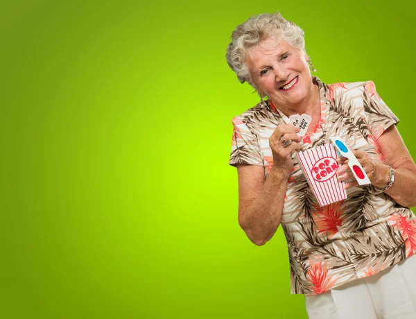Senior Woman Holding 3d Glasses, Popcorn And Tickets — Stock Photo, Image