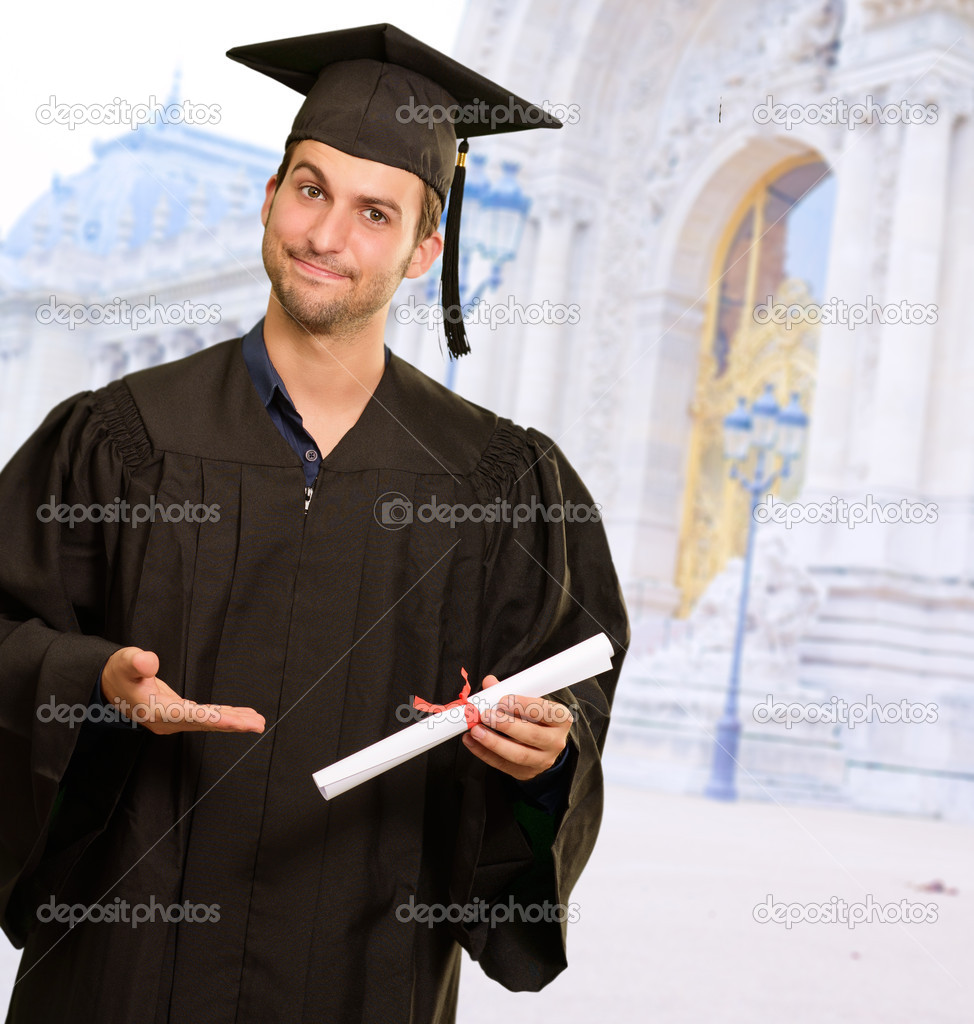 Man graduate student wearing graduation hat and gown, isolated on white  Stock Photo - Alamy