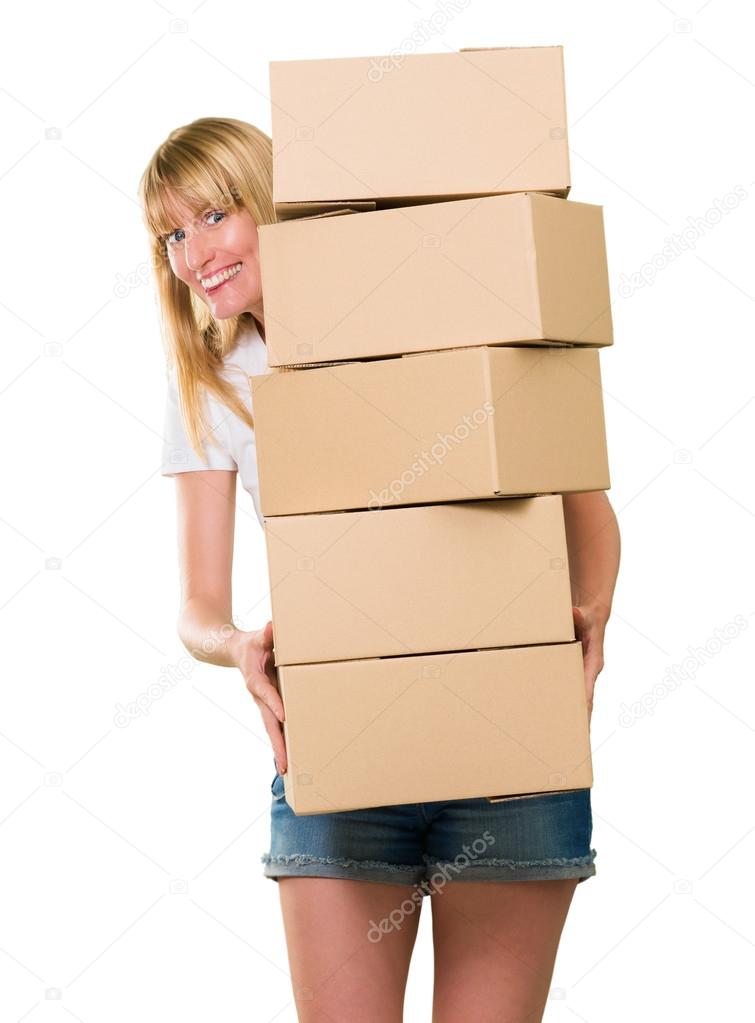 woman holding a pile of boxes