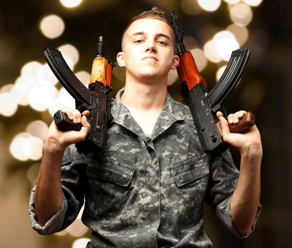 Portrait Of Soldier Holding Gun — Stock Photo, Image