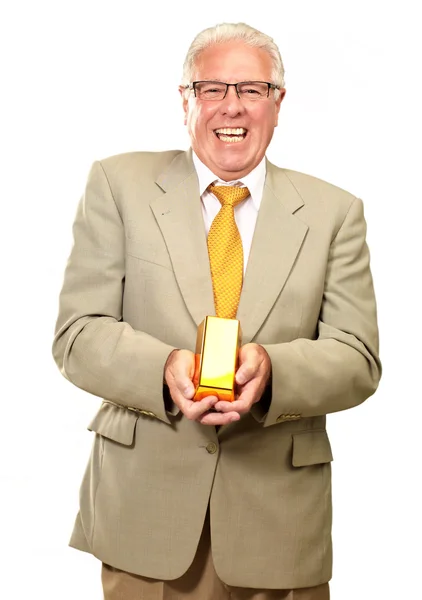 Senior Man Holding Gold Bar — Stock Photo, Image