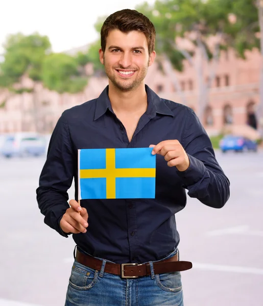 Potrait van een man die vlag — Stockfoto