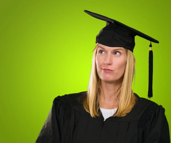 Confused Graduate Woman Holding Digital Tablet — Stock Photo, Image