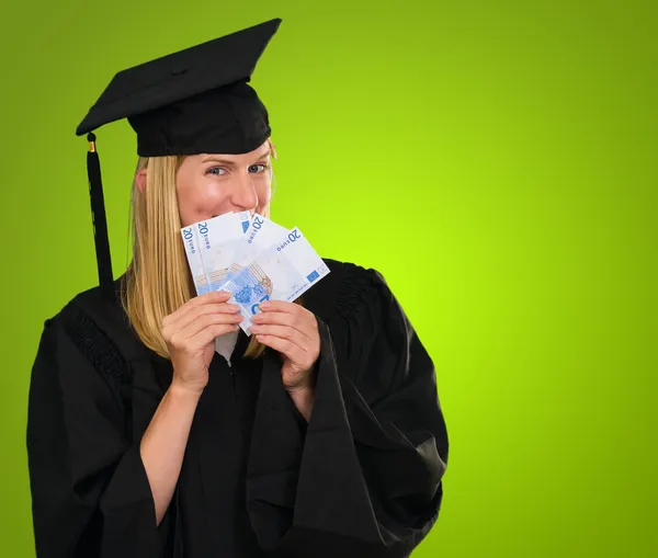 Graduate woman holding euro notes — Stock Photo, Image