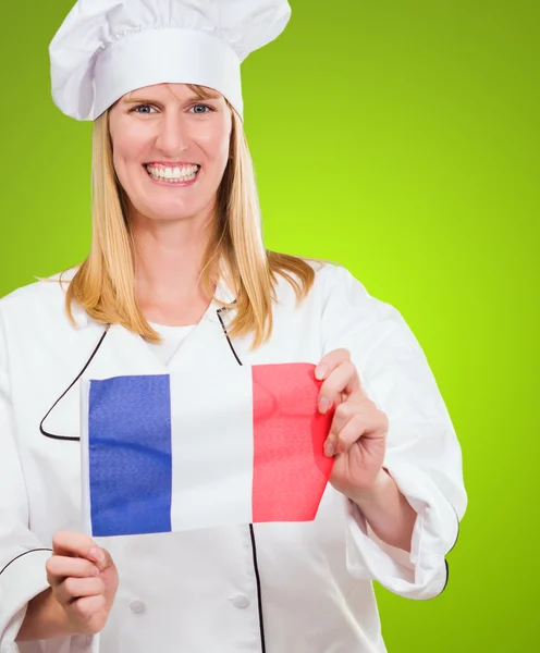 Gelukkig chef-kok bedrijf Franse vlag — Stockfoto