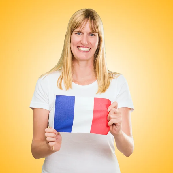 Mulher segurando uma bandeira francesa — Fotografia de Stock