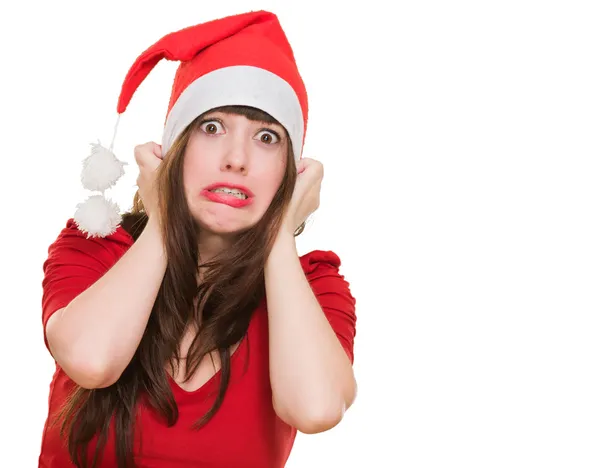 Mujer asustada vistiendo un sombrero de Navidad —  Fotos de Stock