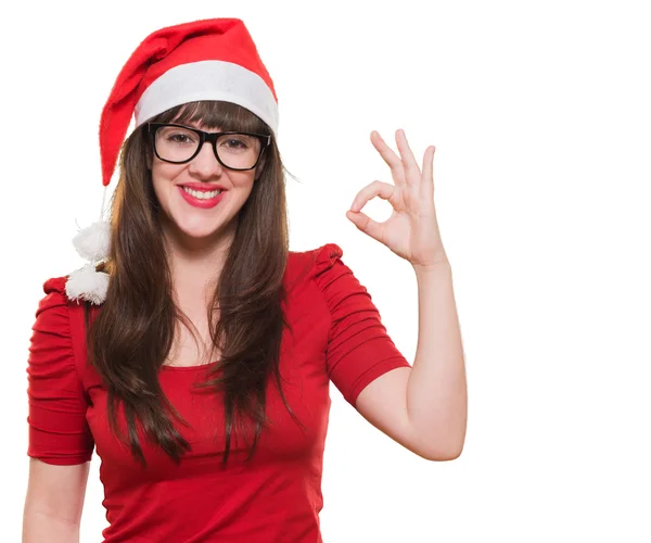Kerstmis vrouw doen een ok gebaar — Stockfoto