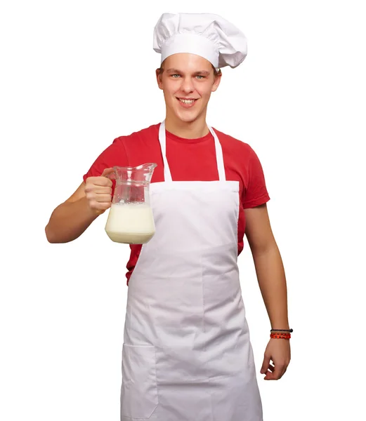 Férfi szakács gazdaság jar a tej — Stock Fotó