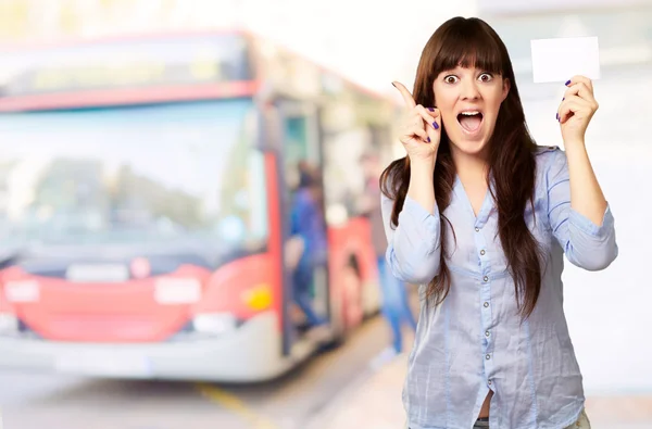 Portrait Of A Girl Holding And Pointing Up — Stock Photo, Image