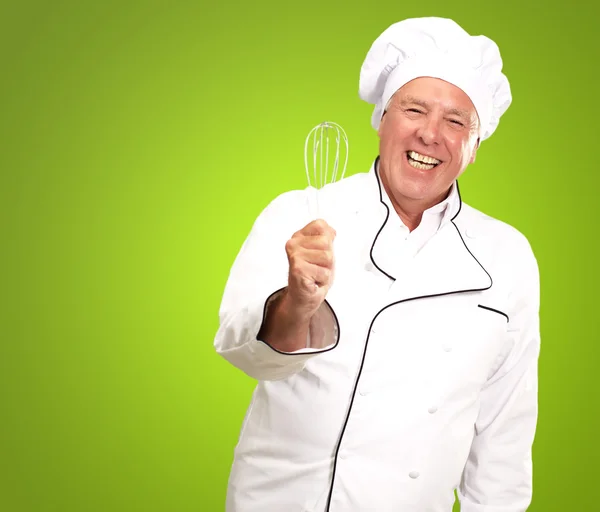 Portrait Of A Senior Male Chef Holding A Beater — Stock Photo, Image