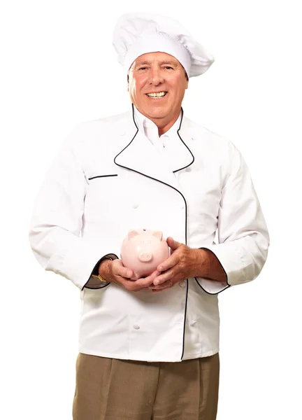 Muotokuva Chef Holding Piggy Bank — kuvapankkivalokuva