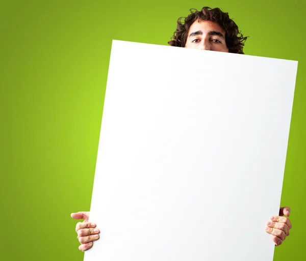 Portrait Of Man Holding a blank billboard — Stock Photo, Image