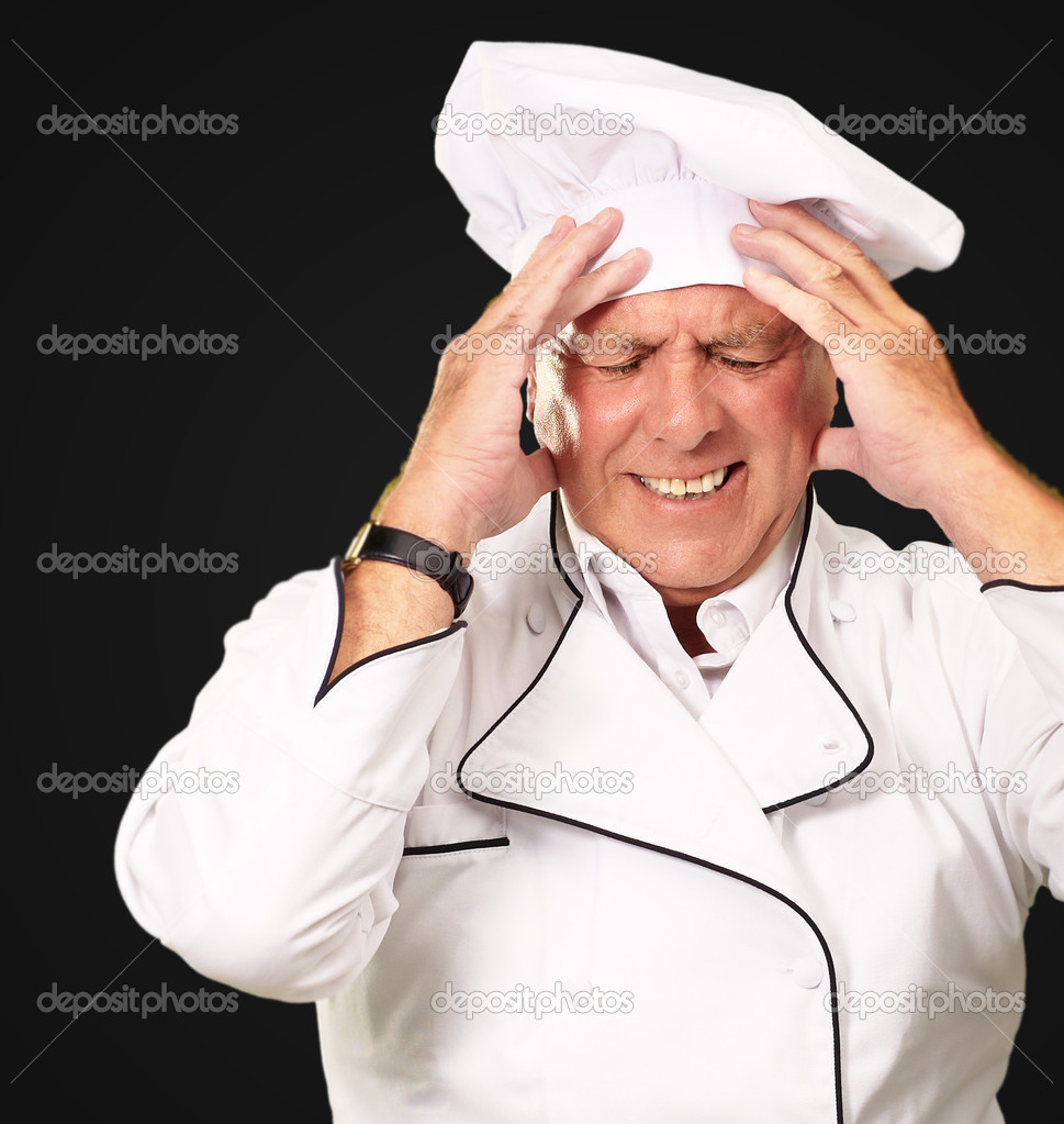 Portrait Of Chef With Painfully Head