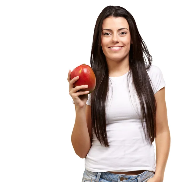 A fiatal nő, kezében egy mangó — Stock Fotó