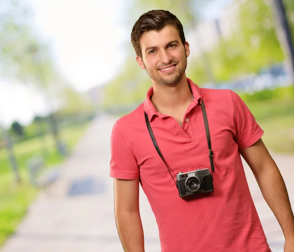 Portrait of a man wearing camera — Stock Photo, Image