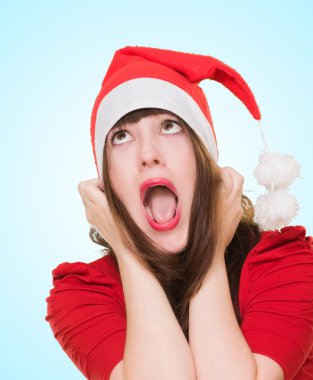 Noel şapka giyen kadın vurguladı
