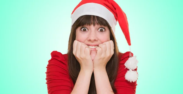 Extremely excited woman wearing a christmas hat — Stock Photo, Image