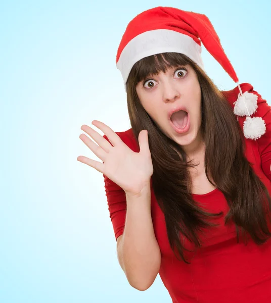 Mulher surpreso usando um chapéu de Natal — Fotografia de Stock