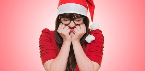 Animado natal mulher com seus olhos fechados — Fotografia de Stock