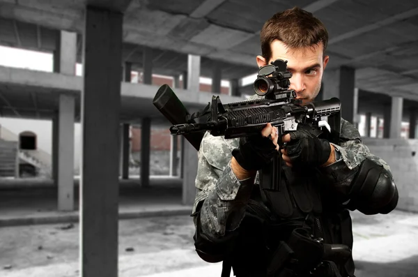 Portrait Of A Soldier Holding Gun — Stock Photo, Image