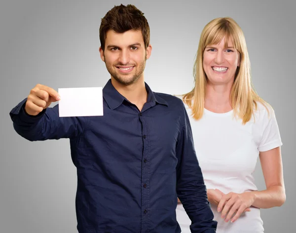 Man Hand Holding Blank Placard And Happy Woman Standing Behind — Stock Photo, Image