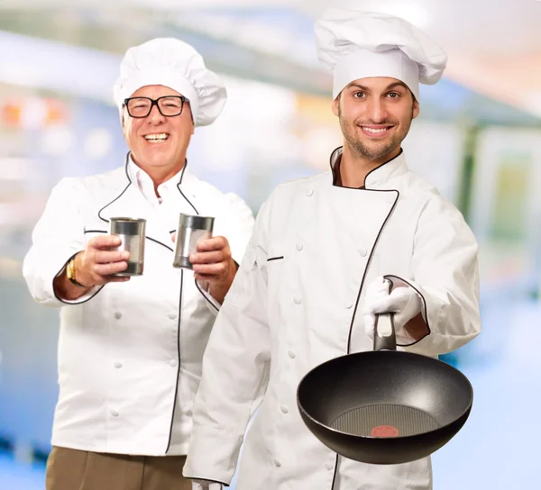 Portrét dvou happy kuchaři — Stock fotografie