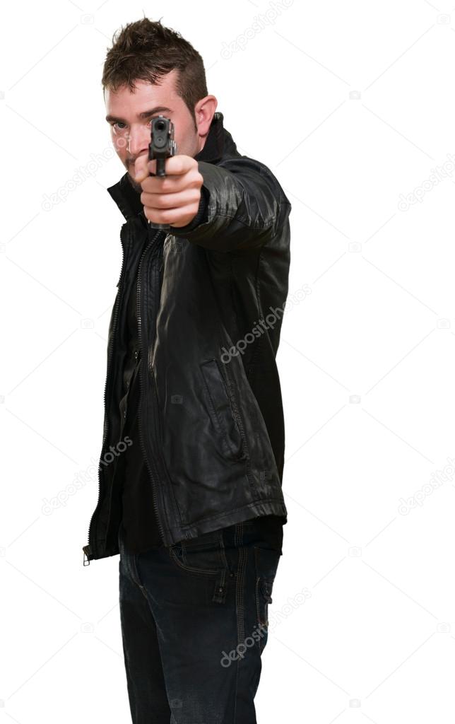 man with leather jacket pointing with gun