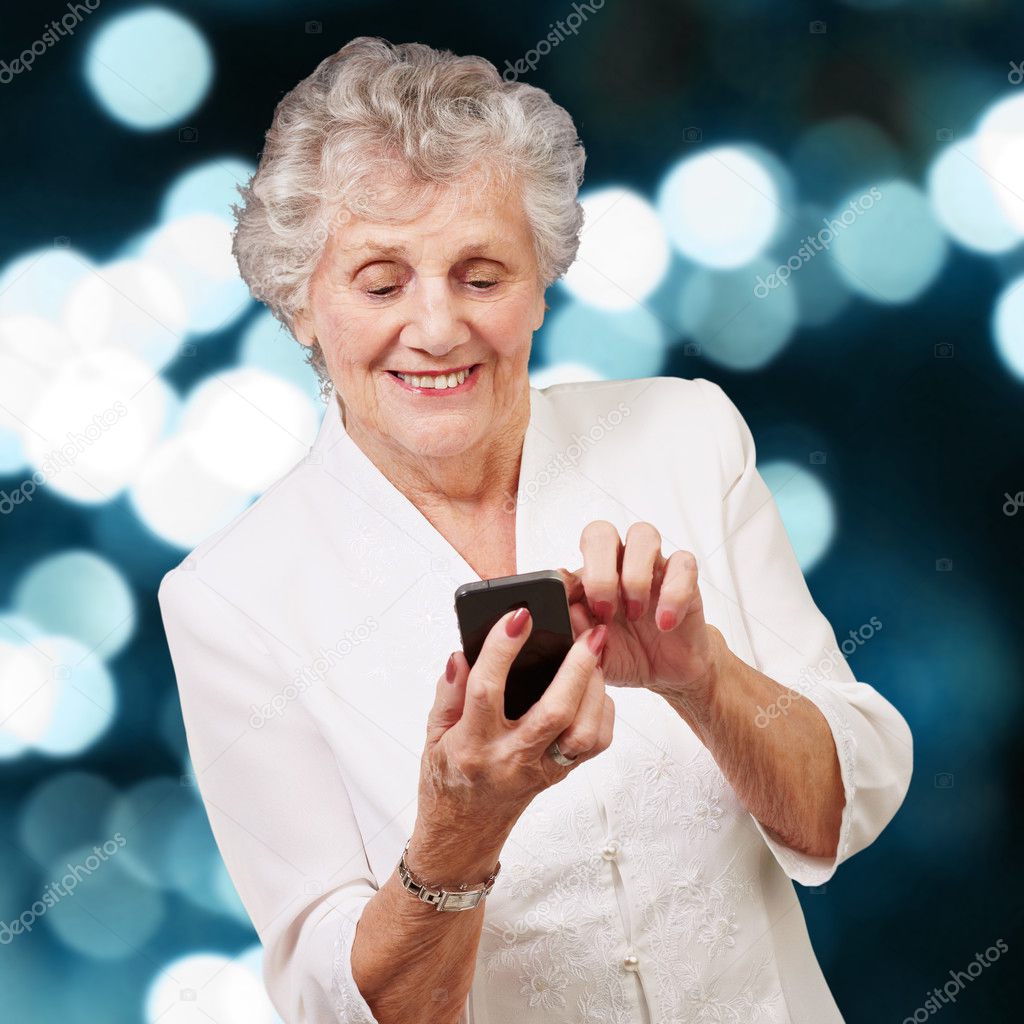 Senior woman using cellphone