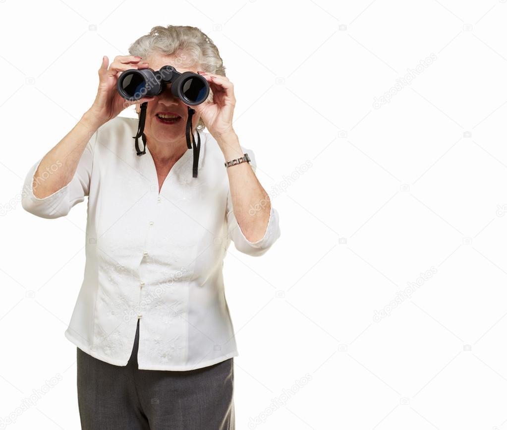 Portrait of a senior woman looking through binoculars