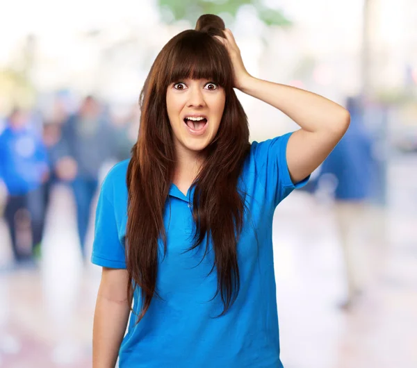 Woman with a shocked expression — Stock Photo, Image