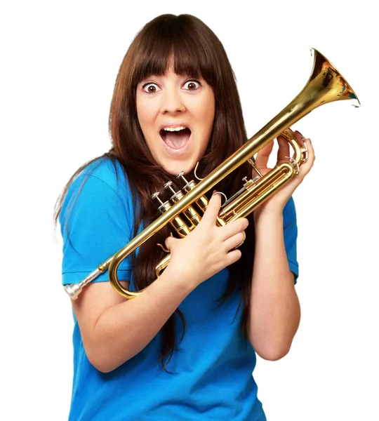 Surprised woman holding trumpet — Stock Photo, Image