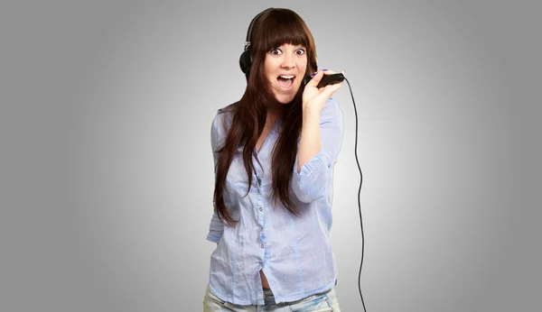 Girl With Headset Singing On Mike — Stock Photo, Image