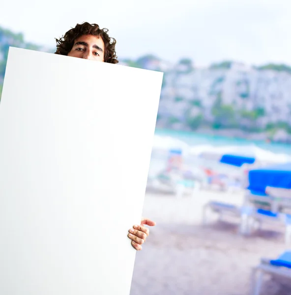 Portrait Of Man Holding a blank billboard — Stock Photo, Image