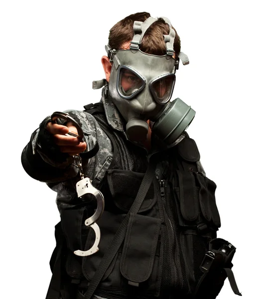 Soldier With A Gas Mask Holding Handcuffs — Stock Photo, Image