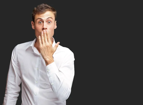 Portrait Of Young Man Covering His Mouth — Stock Photo, Image