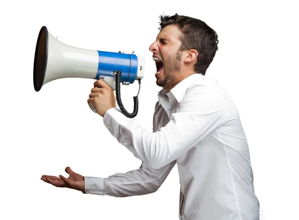 Retrato de um homem gritando em um megafone — Fotografia de Stock