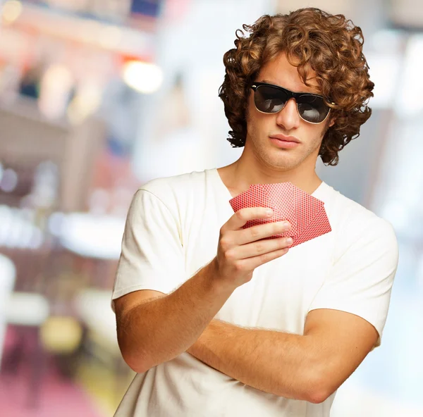 A Man Holding Few Playing Cards — Stockfoto