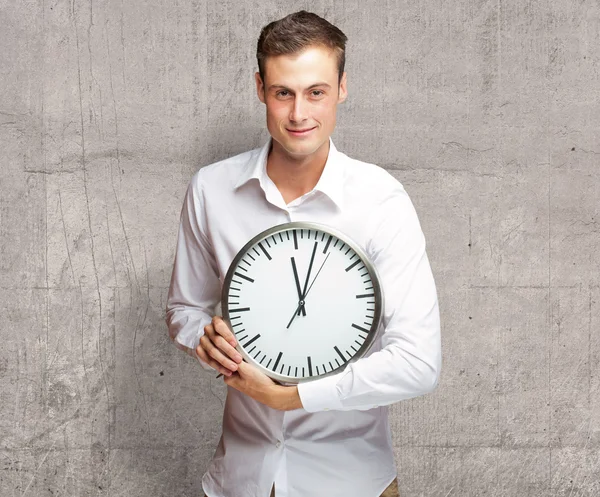 Happy Man Holding Clock In His Hand Stock Picture